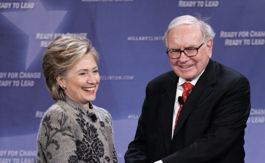 Warren Buffet is a supporter of Hillary Clinton, seen here campaigning with her in 2007. His company, Berkshire Hathaway, received low marks for transparency around its political spending.
