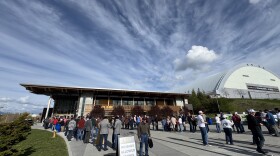 People stand in line outside the Idaho Central Credit Union Arena at the University of Idaho on April 28 for the last stop on Turning Point USA's This is the Turning Point Tour of college campuses.