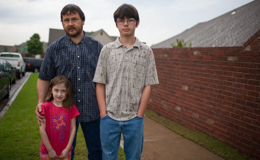 Cary Smith picked up his son Jordan, 13, and daughter Tia, 5, from Eastlake Elementary School on Thursday. He'd picked them up on Monday right before the tornado came through Moore. He and the family live close to Plaza Elementary, and he ran to the school to help pull a teacher and three kids from the rubble in the aftermath of the tornado.