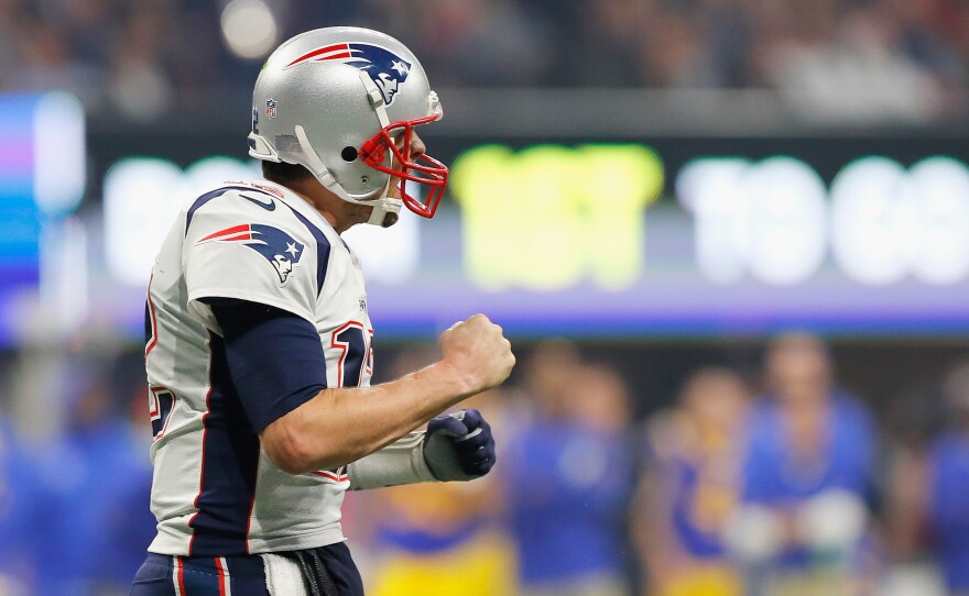 Tom Brady reacts after the New England Patriots score a touchdown in the fourth quarter during Super Bowl LIII