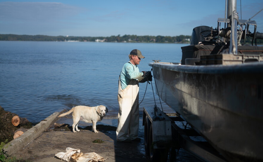 Rice secures his boat before heading back to his fish house in Maryland.