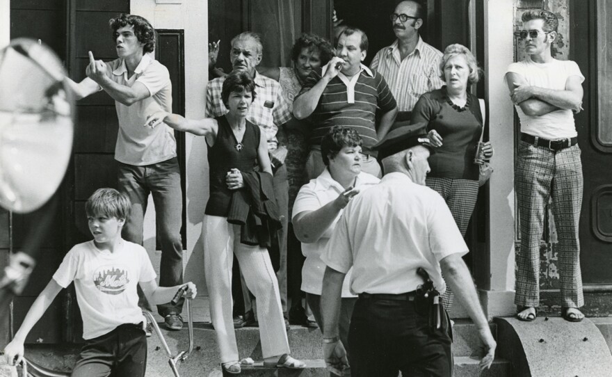 Protesters gather outside South Boston High School in Boston on Sept. 12, 1974, the first day of school under the new busing system put in place to desegregate Boston Public Schools. The system was met with strong resistance from many residents of Boston's neighborhoods.