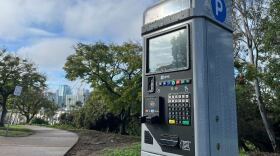 A new parking meter in Balboa Park stands beside a cement path on Jan. 7, 2026.