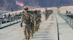 FILE - U.S. Army soldiers cross a floating bridge on the Imjin River during a joint river-crossing exercise between South Korea and the United States as a part of the Freedom Shield military exercise in Yeoncheon, South Korea, March 20, 2025.