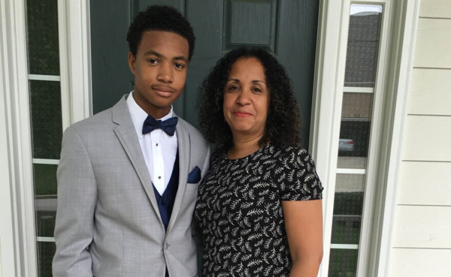 Trevena Garel, retired sergeant, New York City Police Department with her son. Garel has investigated allegations of misconduct involving both uninformed and/or civilian members of the NYPD.