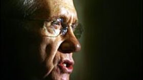 U.S. Senate Majority Leader Harry Reid (D-NV) answers questions from reporters at the U.S. Capitol on March 27, 2007. Reid spoke to reporters about the vote on funding for the Iraq war.