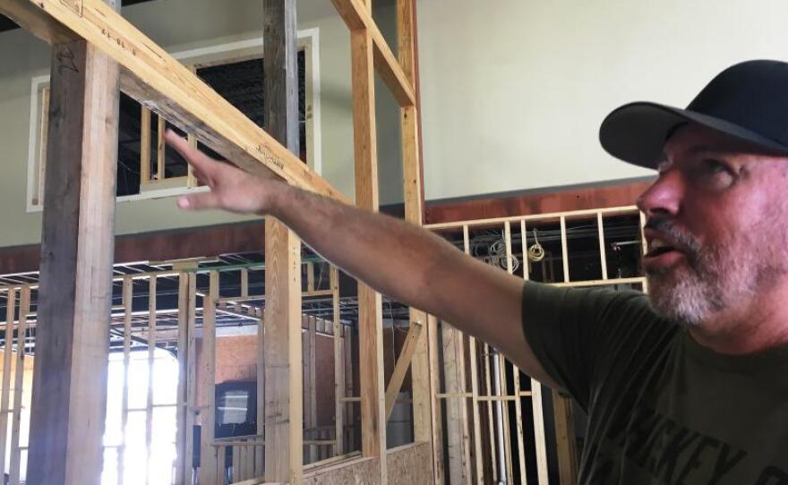 Military retiree Scott Neil is oversees construction of his new distillary in Florida in this undated photo. 