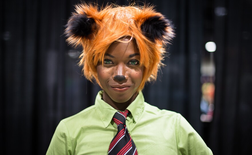 Makeba Hinds, also known as Maki Roll, cosplays at AwesomeCon. She portrays Nick, the fox in Zootopia.