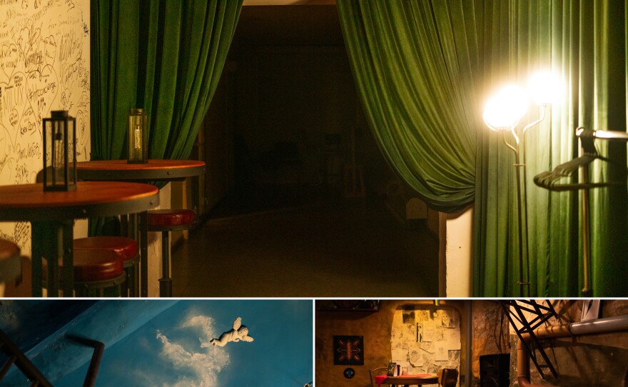 Examples of shelters that also serve other purposes in Kyiv. Top: The entrance to Parovoz, a popular speakeasy-style bar. Bottom: A painted ceiling and tables set for guests at a bar named Cupid. Soviet buildings weren't built to host storefronts - there were no private businesses under Communism, so today many shops in Kyiv are set up in basement shelters.
