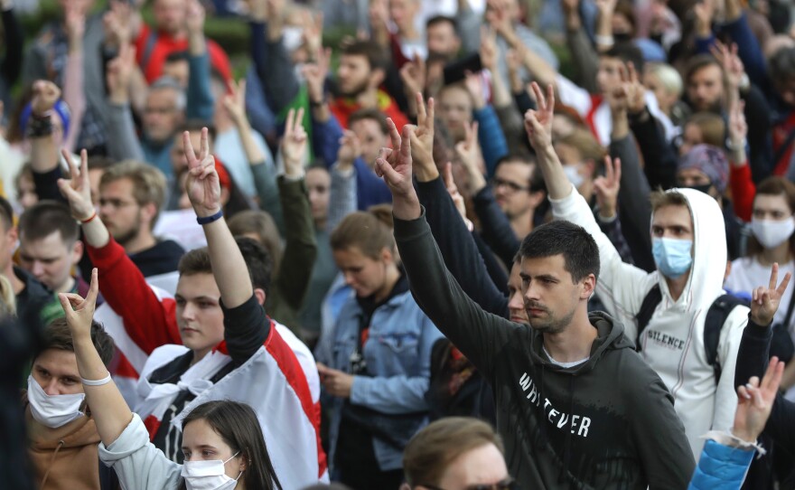 People protest at the Independence Square in Minsk on Thursday.