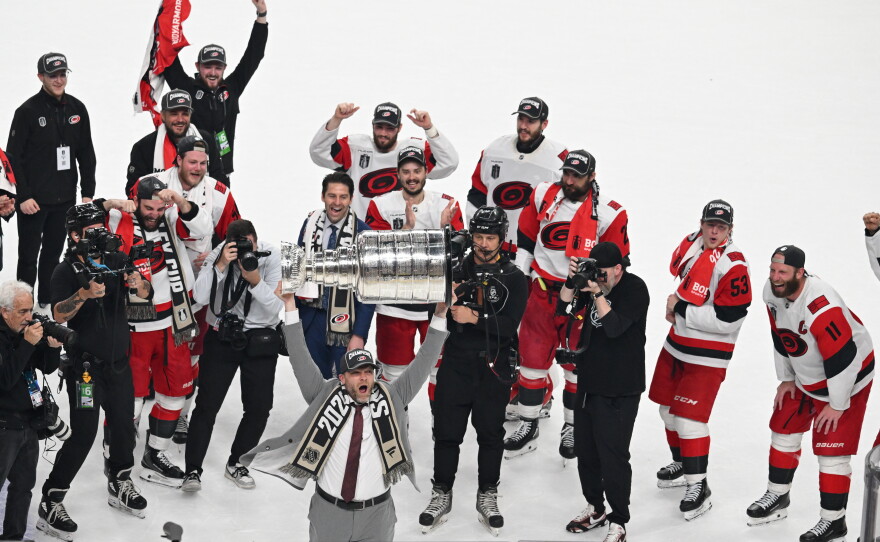 The Carolina Hurricanes celebrates after a win over the Vegas Golden Knights in Game 6 of the NHL hockey Stanley Cup Final series, Sunday, June 14, 2026, in Las Vegas.