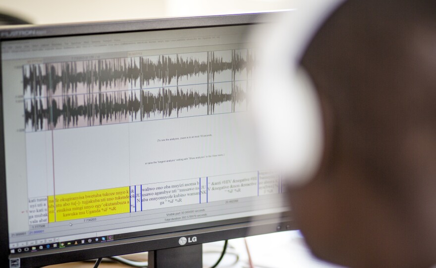 A staffer at Pulse Lab Kampala works on the development of the radio analysis tool. To build the models necessary for speech recognition, hours of audio in each language had to be carefully transcribed.
