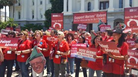 Members of the California Nurses Association and National Nurses United rally for Sen. Bernie Sanders outside the California Capitol on Wednesday, May 11, 2016. 