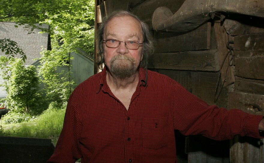 Donald Hall, former poet laureate of the United States and author of numerous poetry books, poses in 2006 in the barn of the 200-year-old Wilmot, N.H., farm that has been in his family for four generations. Hall died on Saturday at age 89.