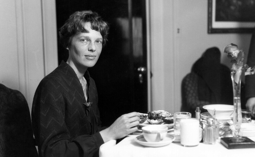 Amelia Earhart eats dinner at a Cleveland hotel. Her in-flight menu, however, was usually simple, often consisting of tomato juice and a hard-boiled egg.