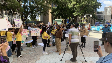 Arts community members rally at Civic Center Plaza before the City Hall budget review committee meeting, May 27, 2026.