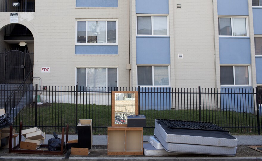 Personal belongings and furniture piled up outside Limes' apartment complex during one of two evictions that took place on March 3.