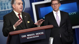 U.S. Secretary of Transportation Ray LaHood (L) answers questions during a briefing as the White House with Press Secretary Jay Carney looks onFebruary 22, 2013 in Washington, DC.
