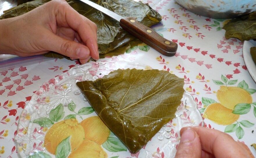 The author learns to fold the leaves with her grandmother in Boston in 2010.