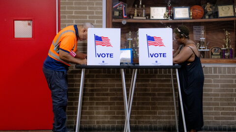 People vote in the primary election at Northwestern High School in Detroit, Tuesday.