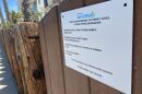 A sign posted outside a short term rental property in the Mission Beach neighborhood of San Diego on May 3, 2023.