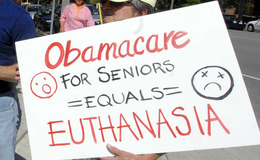 Misconceptions have been circulating about the health overhaul bill that was signed into law earlier this year.  A sign from a 2009 rally references the "death panel" myth.