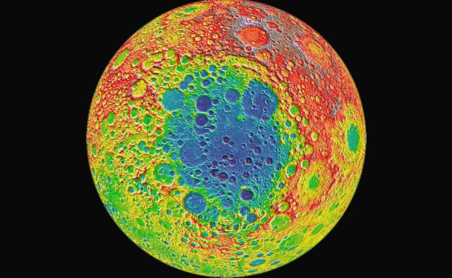 The Chinese lunar lander Chang'e 4 is headed to Aitken Basin, a large impact crater near the moon's south pole, pictured here in blue. The distance from the depths of Aitken Basin to the tops of the highest surrounding peaks is nearly twice the height of Mount Everest, according to NASA.