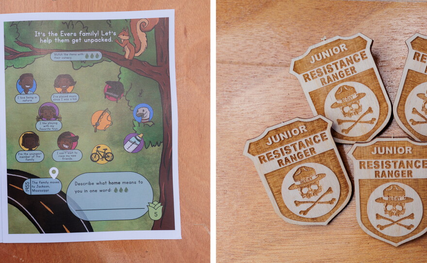 Newly banned booklets from other National Parks are displayed during the America 433+ pop up at Harpers Ferry National Park; Junior Resistance Ranger pins are given out at the same event.