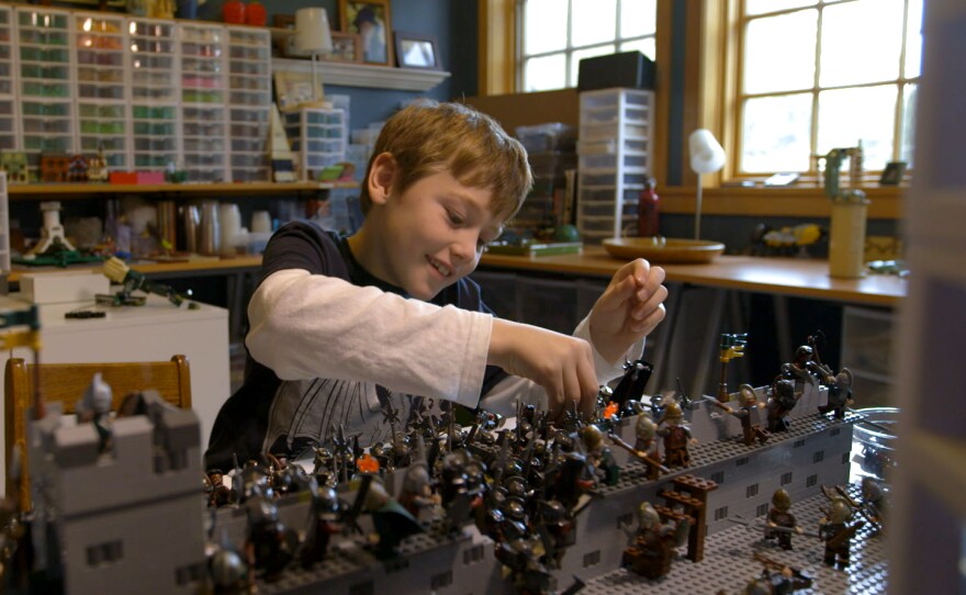 Thorin Finch (son of Seattle Lego legend Alice Finch) plays with bricks in the family's Lego room. But filmmakers Kief Davidson and Daniel Junge say Lego is now much more than just a toy.