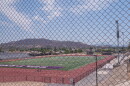 Santana High School's football field, on the east side of campus, is shown through a chain link fence on Aug. 12, 2026.