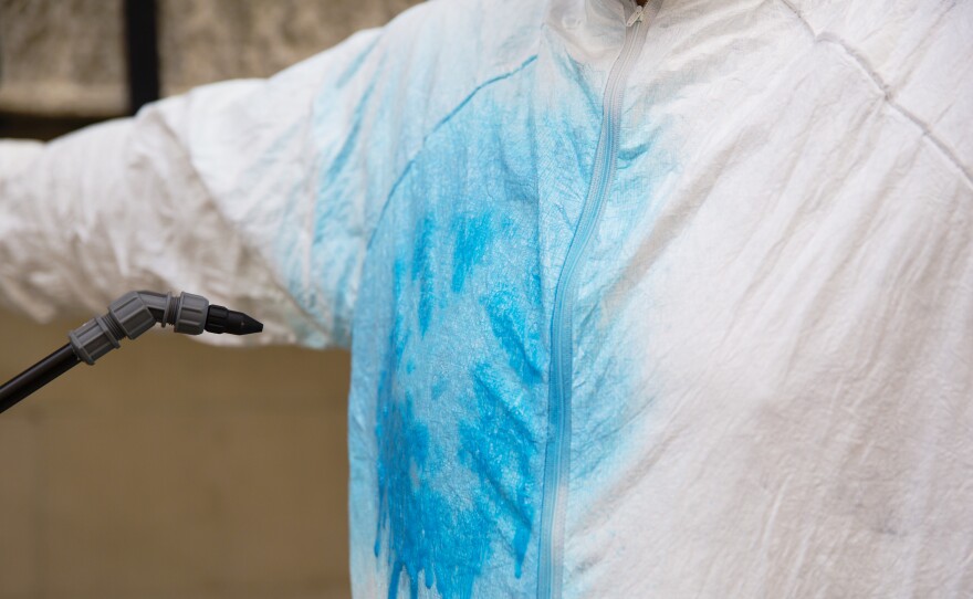 Students at Columbia University devised a spray bleach solution that first shows up as blue, then turns clear, so health workers can easily make sure they've disinfected everything.