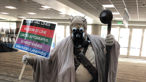 A Tusken Raider guides people to the right place at Comic-Con. July 25, 2024