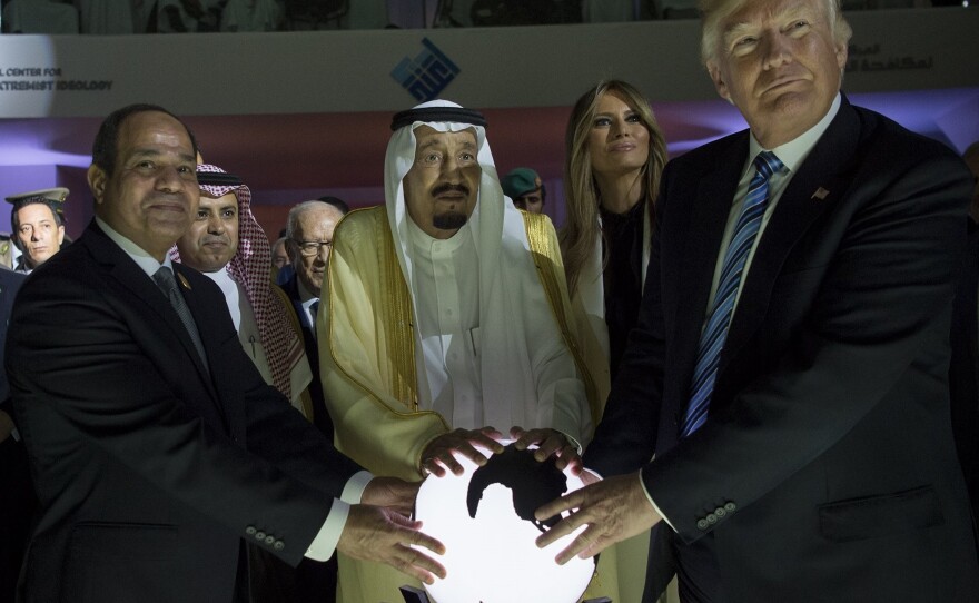 President Trump, Saudi Arabia's King Salman bin Abdulaziz al-Saud (center) and Egyptian President Abdel Fattah el-Sisi (left) place their hands on an illuminated globe as First Lady Melania Trump watches during the inauguration of the Global Center for Combating Extremist Ideology in Riyadh in May.