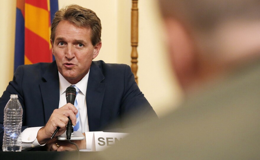 Sen. Jeff Flake, left, R-Ariz., who announced he will not run for reelection on Tuesday, appears at a hearing on border security in Arizona in 2015.