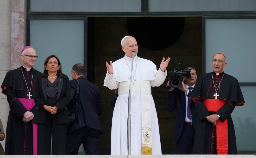 Pope Leo XIV, accompanied by, from left, Prefect of the Pontifical Household Archbishop Petar Rajič, Dean Antonella Polimeni, and his vicar for the city of Rome Cardinal Baldo Reina, visits the Città Universitaria (University City) at Sapienza University of Rome to meet with faculty and students at the institution's primary campus, one of the world's oldest and largest universities, Thursday, May 14, 2026.