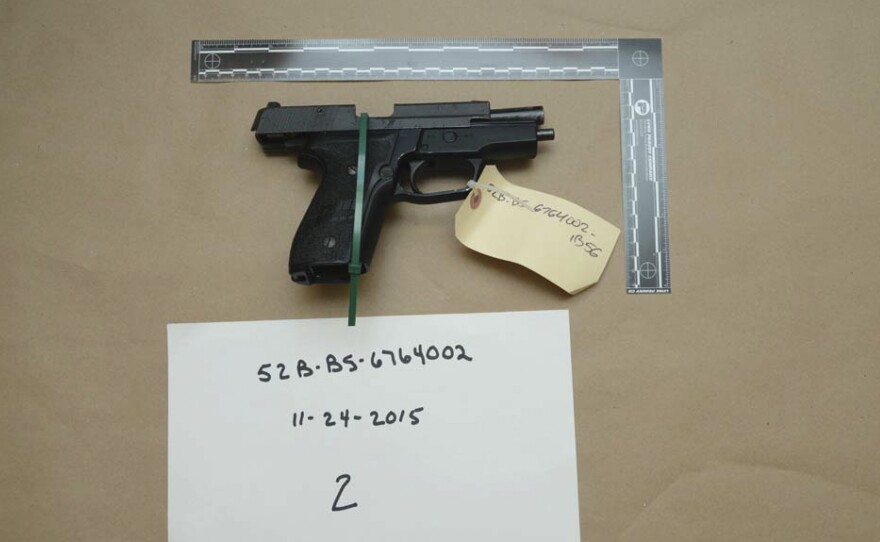 This evidence photo from the criminal complaint of the U.S. District Court for Massachusetts v. Ashley Bigsbee for illegal possession of a stolen firearm on Nov. 15, 2015, in Suffolk, Mass., shows one of ten M11 semiautomatic handguns that former Army Reserve member James Morales stole from the Lincoln Stoddard Army Reserve Center in Worcester, Mass.
