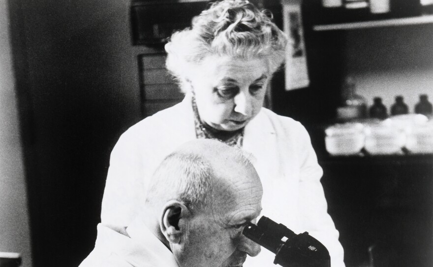 Dr. George Papanicolaou, inventor of Pap test, and his wife Mary (who was also his research partner) in his lab.