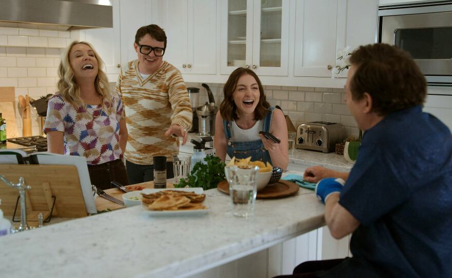 Michael J. Fox (far right) with wife Tracy Pollan, son Sam and daughter Esme.