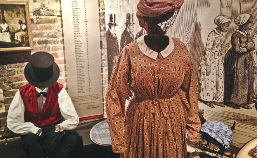 The Freedom House Museum exhibit features wiry mannequins in typical dress for slaves at auction.