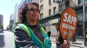 Margarita Mena, 60, stops traffic for pedestrians in San Francisco’s Tenderloin neighborhood on April 24, 2018