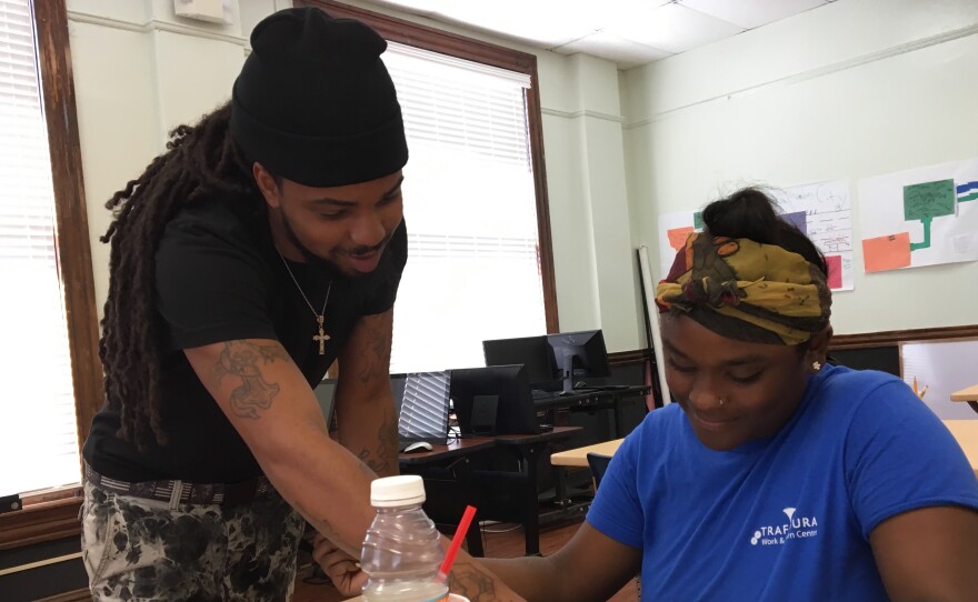 Darren Alridge works as a "para-instructor" at the Youth Empowerment Project. He says police have yet to convince him that they're serious about bringing killers to justice in his community.