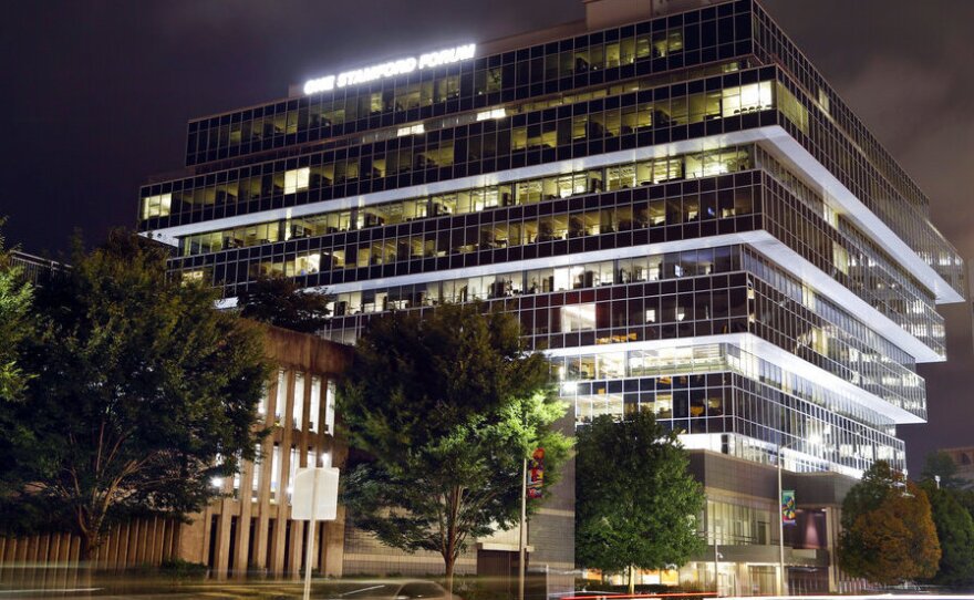 Cars pass Purdue Pharma headquarters, Sept. 12, 2019, in Stamford, Conn. A federal mediator is expected to announce Wednesday, Feb. 16, 2022 or Thursday whether Purdue Pharma and a group of holdout state attorneys general have been able to reach a new settlement in the OxyContin maker's bankruptcy case.