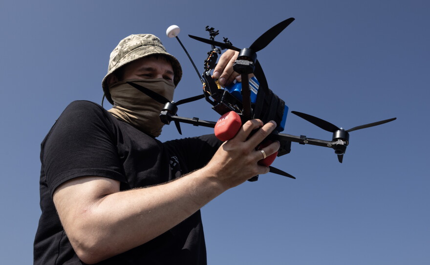 A drone operator with the military call sign Professor operates a Lupynis-10-TFL-1 from The Fourth Law at a test site in central Ukraine.