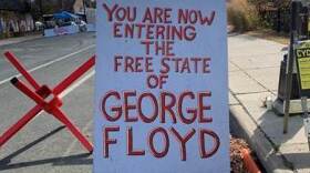 Sign at the entrance of George Floyd Square in Minneapolis.