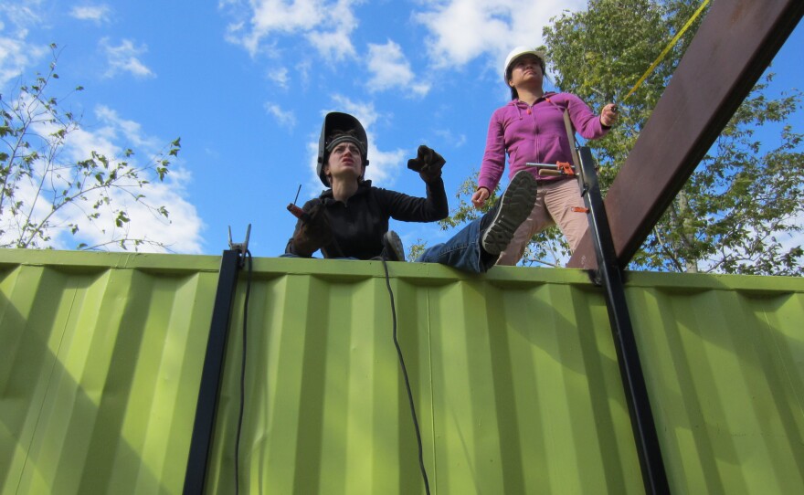 Tulane students Ellanny Page (left) and Vicky Leung helped build the Grow Dat Youth Farm.