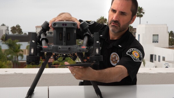 Oceanside police Lt. Michael Provence prepares the drone for launch, Aug. 26, 2025.