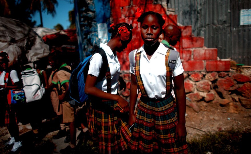 This 2013 photo of schoolgirls in Haiti shows the slow progress in recovering from the 2010 earthquake.