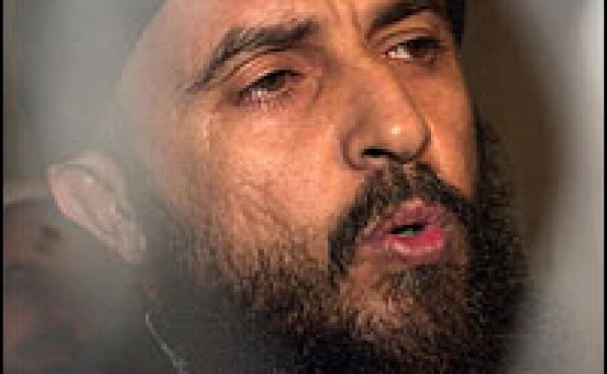 Jamal al-Badawi reacts to his sentencing in February 2005.