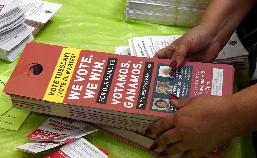 Door hangers are stacked after a rally with Jacky Rosen, a Democrat who later won her Senate race, at the Culinary Workers Union Hall Local 226 on Nov. 5 in Las Vegas. Organizations like the Culinary Workers Union made a big push to engage Latinos in 2018.