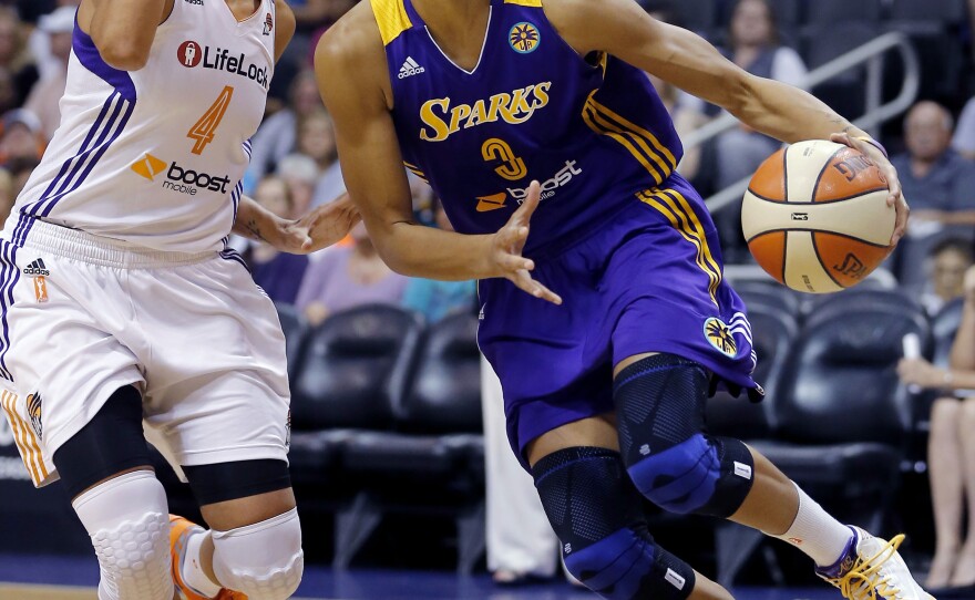 Candace Parker (right) of the Los Angeles Sparks and Candice Dupree of the Phoenix Mercury, during Game 2 of an WNBA semifinal series in September.